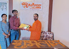 Satisfied home buyers receiving property documents Ramdoot Infra